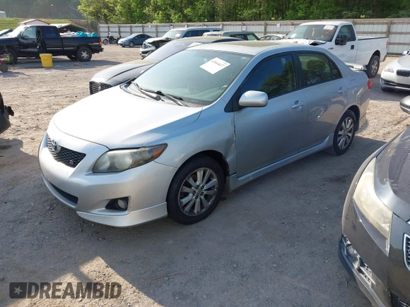 2010 Toyota Corolla with VIN 2T1BU4EE8AC447952, listed as a IAAI auction lot 42044627 with 213,962 mi miles. Bid and sale history available at carsss.com. Image 2.