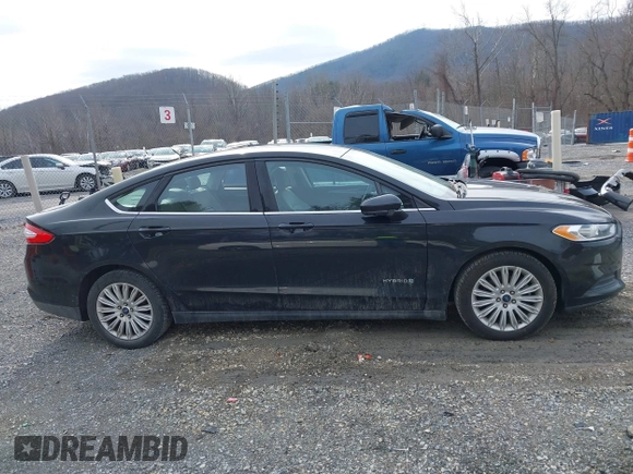 2015 Ford Fusion S Hybrid with VIN 3FA6P0UU8FR283233, listed as a IAAI auction lot 41501282 with 190,809 mi miles. Bid and sale history available at carsss.com. Image 13.