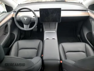 2023 Tesla Model Y Long Range z VIN 7SAYGDEE4PF836872, wystawiony jako Copart lot #45566235 z przebiegiem 7 674 mil mil oraz Szkoda całkowita • Salvage title. Historia ofert i sprzedaży dostępna na DreamBid. Obrazek 8.