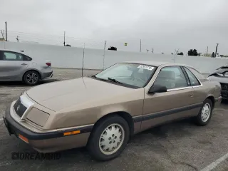 1988 Chrysler LeBaron z VIN 1C3CJ41E1JG311333, wystawiony jako Copart lot #52951235 z przebiegiem 26 013 mil mil oraz Szkoda całkowita • Salvage title. Historia ofert i sprzedaży dostępna na DreamBid. Obrazek 1.