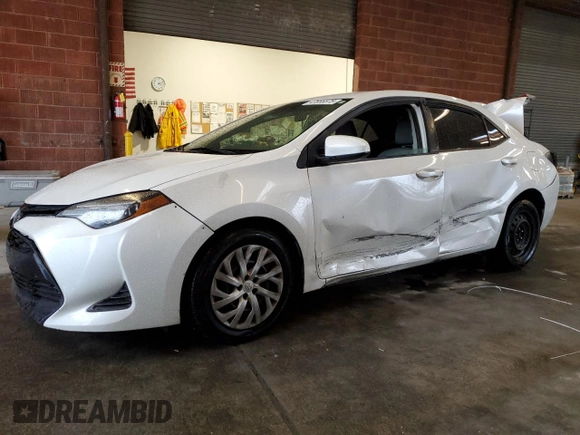 2019 Toyota Corolla L z VIN 5YFBURHEXKP940266, wystawiony jako Copart lot #47655575 z przebiegiem 119 022 mil mil oraz Szkoda całkowita • Salvage title. Historia ofert i sprzedaży dostępna na DreamBid. Obrazek 1.