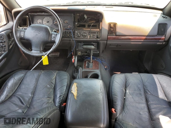 1998 Jeep Grand Cherokee Limited with VIN 1J4GZ88Z9WC148445, listed as a Copart auction lot 65961744 with 180,067 mi miles and Clean Title. Bid and sale history available at carsss.com. Image 8.