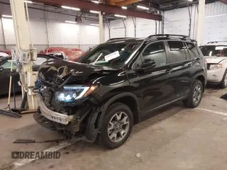 2023 Honda Passport TrailSport with VIN 5FNYF8H64PB016819, listed as a IAAI auction lot 41997402 with 22,106 mi miles and . Bid and sale history available at DreamBid. Image 6.
