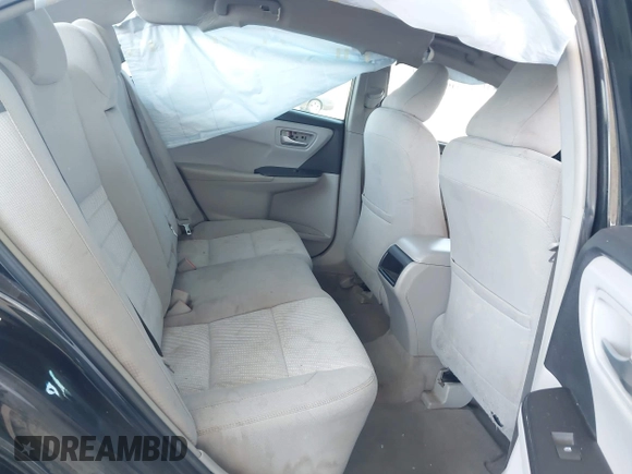 2015 Toyota Camry XLE with VIN 4T1BF1FK9FU965992, listed as a IAAI auction lot 42136728 with 147,209 mi miles and . Bid and sale history available at DreamBid. Image 8.