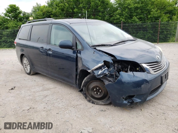 2012 Toyota Sienna XLE AAS with VIN 5TDYK3DC7CS216061, listed as a Copart auction lot 60596715 with 112,713 mi miles and Salvage title. Bid and sale history available at DreamBid. Image 4.