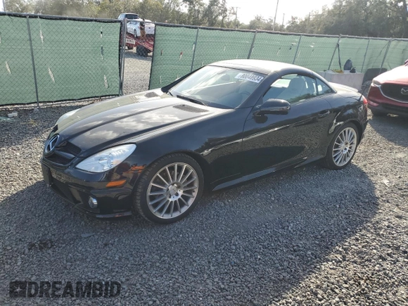 2009 Mercedes-Benz SLK-Class 3.0L with VIN WDBWK54F79F190128, listed as a Copart auction lot 80048934 with 32,354 mi miles and Salvage Title. Bid and sale history available at carsss.com. Image 1.