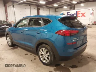 2019 Hyundai Tucson SE with VIN KM8J2CA48KU027746, listed as a IAAI auction lot 41986052 with 93,261 mi miles. Bid and sale history available at carsss.com. Image 3.