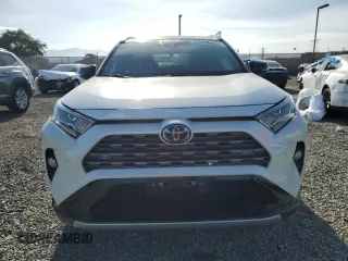 2021 Toyota RAV4 Hybrid XSE with VIN 2T3E6RFV1MW018990, listed as a Copart auction lot 64043865 with 55,938 mi miles and Salvage title. Bid and sale history available at DreamBid. Image 5.