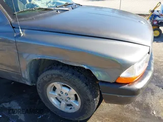 2001 Dodge Dakota with VIN 1B7FL26X91S342103, listed as a IAAI auction lot 41277465 with 157,993 mi miles. Bid and sale history available at carsss.com. Image 6.