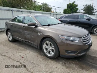 2015 Ford Taurus SEL with VIN 1FAHP2E89FG193926, listed as a Copart auction lot 61036375 with 23,963 mi miles and Salvage title. Bid and sale history available at DreamBid. Image 4.