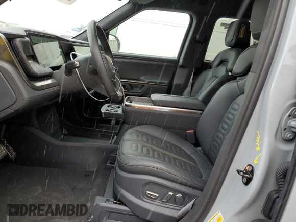 2022 Rivian R1T Launch Edition z VIN 7FCTGAALXNN004228, wystawiony jako Copart lot #43226985 z przebiegiem 4 mil mil oraz Szkody całkowita. Historia ofert i sprzedaży dostępna na DreamBid. Obrazek 7.