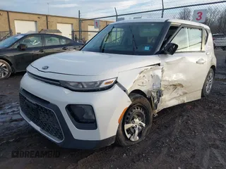2020 Kia Soul LX with VIN KNDJ23AU5L7703963, listed as a IAAI auction lot 41211735 with 56,568 mi miles. Bid and sale history available at carsss.com. Image 2.