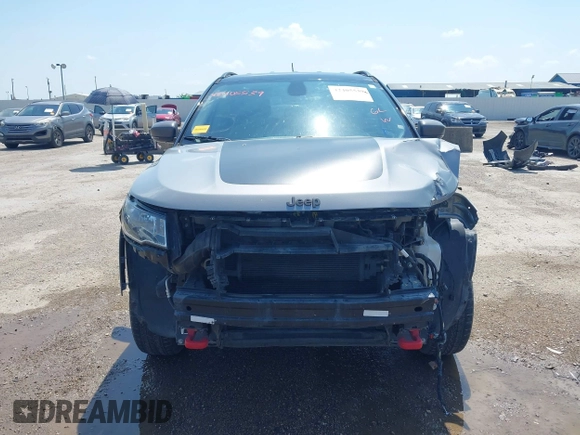 2018 Jeep Compass Trailhawk with VIN 3C4NJDDB2JT198784, listed as a IAAI auction lot 42405539 with 121,553 mi miles and . Bid and sale history available at DreamBid. Image 13.