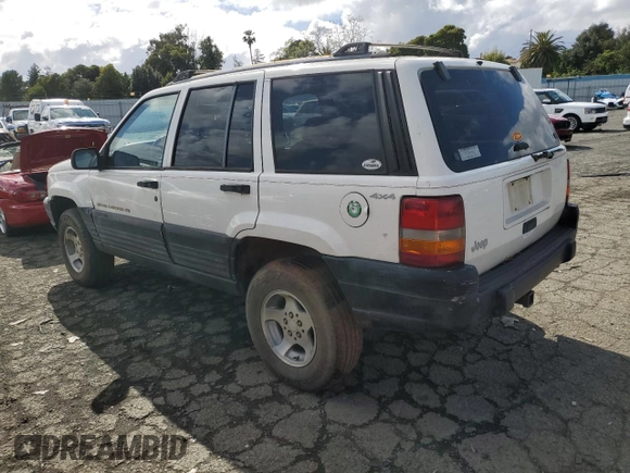 1997 Jeep Grand Cherokee Laredo with VIN 1J4GZ58S8VC647415, listed as a Copart auction lot 49258934 with 0 mi miles and Salvage Title. Bid and sale history available at carsss.com. Image 2.