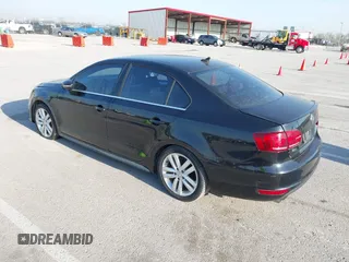 2013 Volkswagen Jetta GLI with VIN 3VW4S7AJ2DM300120, listed as a IAAI auction lot 42002950 with 106,304 mi miles and . Bid and sale history available at DreamBid. Image 3.