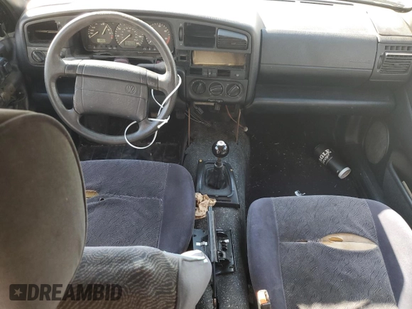 1997 Volkswagen Passat with VIN WVWGG83A0VB009323, listed as a Copart auction lot 73042334 with 261,740 mi miles and Salvage title. Bid and sale history available at DreamBid. Image 8.