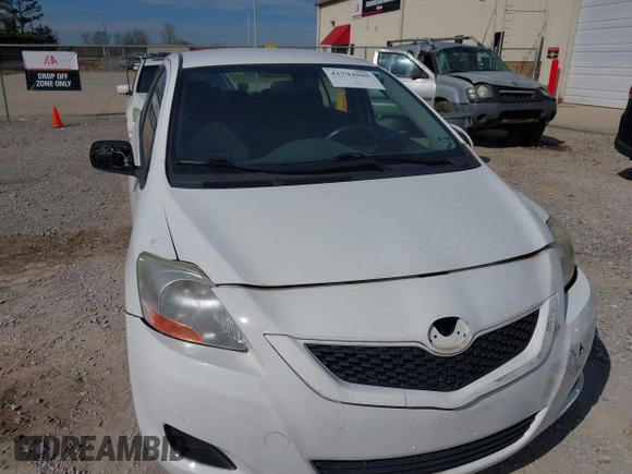 2009 Toyota Yaris with VIN JTDBT903991303431, listed as a IAAI auction lot 41794505 with 183,917 mi miles. Bid and sale history available at carsss.com. Image 6.