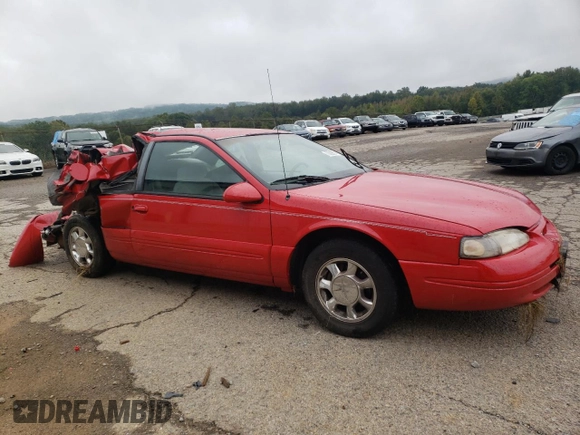1996 Ford Thunderbird LX z VIN 1FALP62W8TH174603, wystawiony jako Copart lot #72928574 z przebiegiem 153 614 mil mil oraz Szkoda całkowita • Salvage title. Historia ofert i sprzedaży dostępna na DreamBid. Obrazek 4.