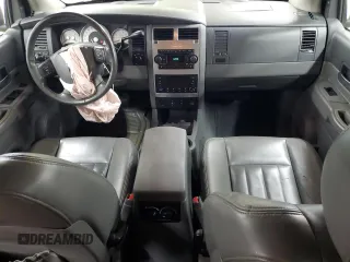 2004 Dodge Durango Limited z VIN 1D4HB58D34F121080, wystawiony jako Copart lot #57156575 z przebiegiem 124 190 mil mil oraz Szkoda całkowita • Salvage title. Historia ofert i sprzedaży dostępna na DreamBid. Obrazek 8.