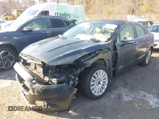 2015 Ford Fusion SE Hybrid with VIN 3FA6P0LUXFR165766, listed as a IAAI auction lot 41409353 with 32,388 mi miles. Bid and sale history available at carsss.com. Image 2.