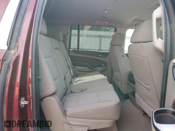 2019 Chevrolet Suburban LS with VIN 1GNSCGKC0KR322367, listed as a Copart auction lot 60295595 with 85,776 mi miles and Salvage title. Bid and sale history available at DreamBid. Image 11.