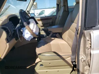 2000 Land Rover Discovery Cloth z VIN SALTY1242YA252357, wystawiony jako Copart lot #76602914 z przebiegiem 107 927 mil mil oraz Szkoda całkowita • Salvage title. Historia ofert i sprzedaży dostępna na DreamBid. Obrazek 7.