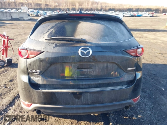 2021 Mazda CX-5 Touring with VIN JM3KFBCM2M1303063, listed as a IAAI auction lot 41814604 with 36,116 mi miles. Bid and sale history available at carsss.com. Image 16.