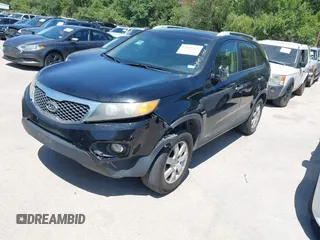 2013 Kia Sorento LX with VIN 5XYKT3A64DG363163, listed as a IAAI auction lot 42811435 with 199,427 mi miles and . Bid and sale history available at DreamBid. Image 2.