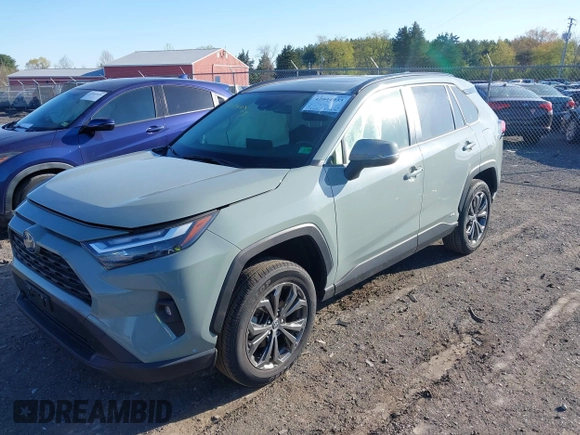 2023 Toyota RAV4 Hybrid XLE Premium with VIN JTMB6RFV3PD116696, listed as a IAAI auction lot 42044933 with 18,553 mi miles. Bid and sale history available at carsss.com. Image 17.