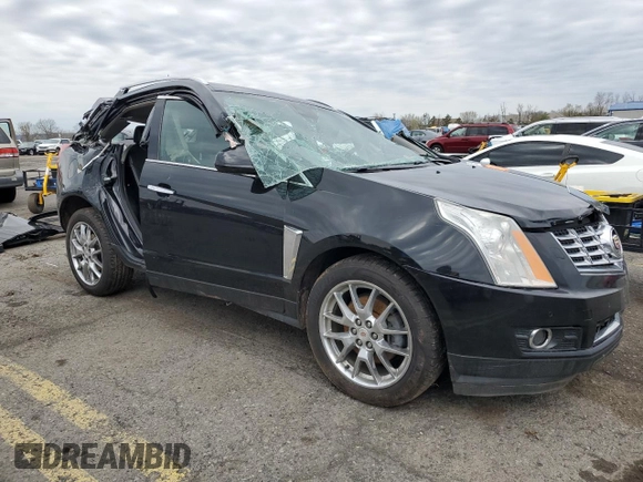 2014 Cadillac SRX Premium Collection z VIN 3GYFNGE31ES688270, wystawiony jako Copart lot #52795245 z przebiegiem 134 103 mil mil oraz Szkoda całkowita • Salvage title. Historia ofert i sprzedaży dostępna na DreamBid. Obrazek 4.