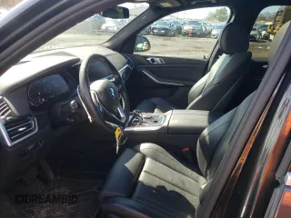 2021 BMW X5 xDrive45e with VIN 5UXTA6C01M9H62393, listed as a Copart auction lot 47083315 with 66,910 mi miles and Salvage title. Bid and sale history available at DreamBid. Image 7.