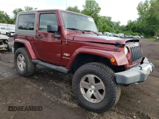 2008 Jeep Wrangler Sahara with VIN 1J4FA54178L566037, listed as a Copart auction lot 61439685 with 115,812 mi miles and Salvage title. Bid and sale history available at DreamBid. Image 4.