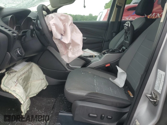 2016 Ford Escape SE z VIN 1FMCU9G93GUC68226, wystawiony jako Copart lot #56764355 z przebiegiem Nie podano mil oraz Szkoda całkowita • Salvage title. Historia ofert i sprzedaży dostępna na DreamBid. Obrazek 7.
