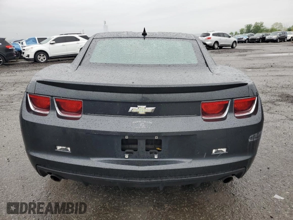 2013 Chevrolet Camaro LS с VIN 2G1FA1E38D9223116, выставлен на аукционе Copart как лот 56469025 с пробегом 174 565 миль миль и Списание • Salvage title. История ставок и продаж доступна на DreamBid. Изображение 6.