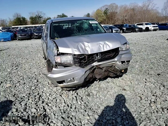 2013 Honda Ridgeline Sport z VIN 5FPYK1F70DB018035, wystawiony jako Copart lot #50519355 z przebiegiem Nie podano mil oraz Szkoda całkowita • Salvage title. Historia ofert i sprzedaży dostępna na DreamBid. Obrazek 10.