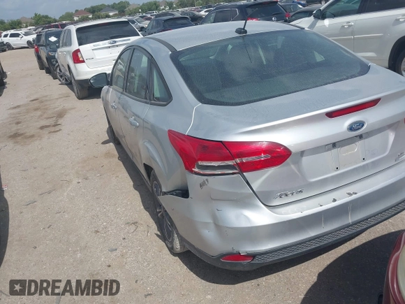 2017 Ford Focus SE with VIN 1FADP3FEXHL285064, listed as a IAAI auction lot 42528911 with 118,659 mi miles and . Bid and sale history available at DreamBid. Image 3.