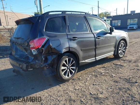 2017 Subaru Forester Touring with VIN JF2SJGTC3HH516646, listed as a IAAI auction lot 40560446 with 85,842 mi miles. Bid and sale history available at carsss.com. Image 4.