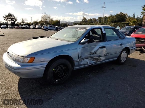 1993 Ford Taurus with VIN 1FACP5216PG197713, listed as a Copart auction lot 80982424 with 79,330 mi miles and Salvage title. Bid and sale history available at DreamBid. Image 1.