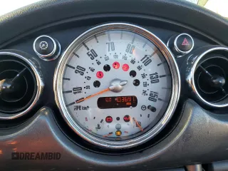 2007 MINI Convertible S with VIN WMWRH33587TJ43499, listed as a Copart auction lot 76266684 with 103,691 mi miles and Salvage title. Bid and sale history available at DreamBid. Image 9.