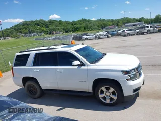 2015 Chevrolet Tahoe LT with VIN 1GNSKBKC8FR194164, listed as a IAAI auction lot 42315215 with 211,797 mi miles and . Bid and sale history available at DreamBid. Image 13.