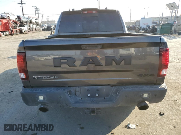 2018 Ram 1500 Rebel z VIN 1C6RR7YT1JS161619, wystawiony jako Copart lot #58272215 z przebiegiem 49 567 mil mil oraz Szkoda całkowita • Salvage title. Historia ofert i sprzedaży dostępna na DreamBid. Obrazek 6.