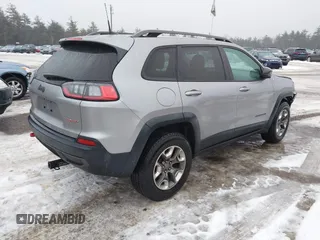 2019 Jeep Cherokee Trailhawk z VIN 1C4PJMBX2KD298169, wystawiony jako IAAI lot #41412123 z przebiegiem 63 214 mil mil oraz . Historia ofert i sprzedaży dostępna na DreamBid. Obrazek 4.