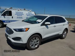 2024 Ford Edge Titanium z VIN 2FMPK4K98RBA75080, wystawiony jako IAAI lot #41843758 z przebiegiem 8687 mil mil oraz . Historia ofert i sprzedaży dostępna na DreamBid. Obrazek 2.