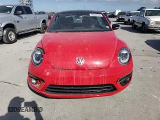 2014 Volkswagen Beetle Turbo R-Line with VIN 3VWVT7AT0EM656599, listed as a Copart auction lot 86358334 with 66,050 mi miles and Salvage Title. Bid and sale history available at DreamBid. Image 5.