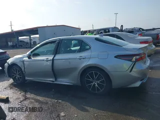 2021 Toyota Camry SE Nightshade with VIN 4T1G11AKXMU599663, listed as a IAAI auction lot 41902392 with 76,909 mi miles. Bid and sale history available at carsss.com. Image 14.