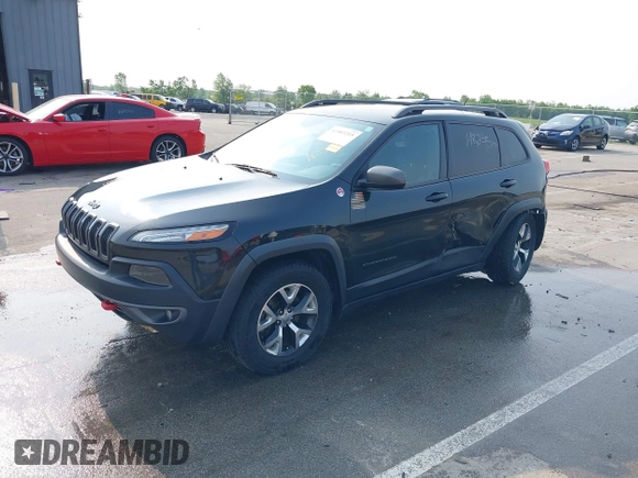 2015 Jeep Cherokee Trailhawk with VIN 1C4PJMBS6FW786622, listed as a IAAI auction lot 42403215 with 148,205 mi miles and . Bid and sale history available at DreamBid. Image 17.