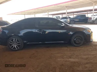 2014 Scion tC z VIN JTKJF5C75E3069757, wystawiony jako IAAI lot #42175725 z przebiegiem 191 054 mil mil oraz . Historia ofert i sprzedaży dostępna na DreamBid. Obrazek 13.