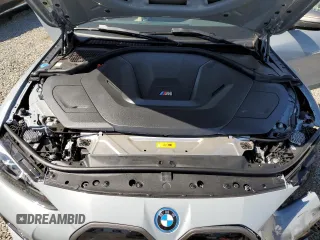2023 BMW i4 M50 z VIN WBY33AW09PFR22046, wystawiony jako Copart lot #57665795 z przebiegiem 15 101 mil mil oraz Szkoda całkowita • Salvage title. Historia ofert i sprzedaży dostępna na DreamBid. Obrazek 11.