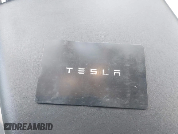 2021 Tesla Model 3 Long Range with VIN 5YJ3E1EB6MF053940, listed as a IAAI auction lot 41344978 with 38,544 mi miles and . Bid and sale history available at DreamBid. Image 11.