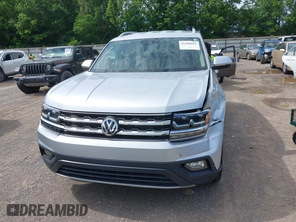 2018 Volkswagen Atlas SE with VIN 1V2DR2CAXJC521412, listed as a IAAI auction lot 42309661 with 99,045 mi miles and . Bid and sale history available at DreamBid. Image 12.